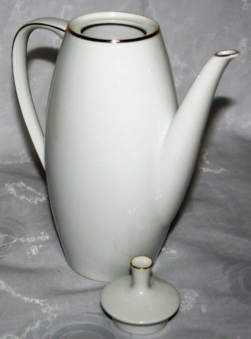 This is a lovely Tea Or Coffee Pot Vintage Porcelain by Fritz Thomas. It is spectacular with gold