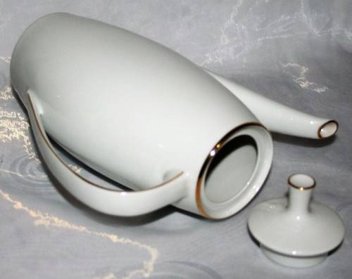 This is a lovely Tea Or Coffee Pot Vintage Porcelain by Fritz Thomas. It is spectacular with gold