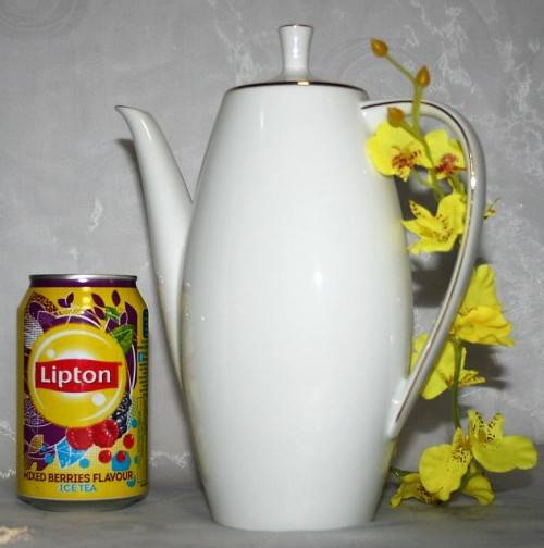 This is a lovely Tea Or Coffee Pot Vintage Porcelain by Fritz Thomas. It is spectacular with gold