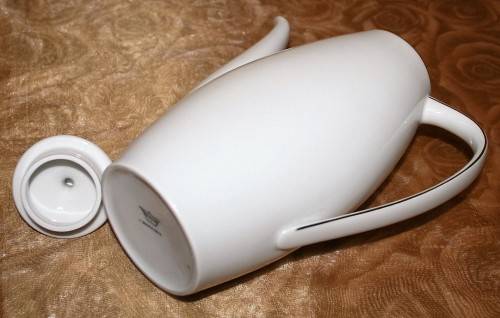 This is a lovely Tea Or Coffee Pot Vintage Porcelain by Fritz Thomas. It is spectacular with gold
