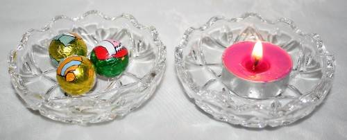 Here is a small, beautiful, round cut glass trinket dish with an unusual saw toothed edge on both