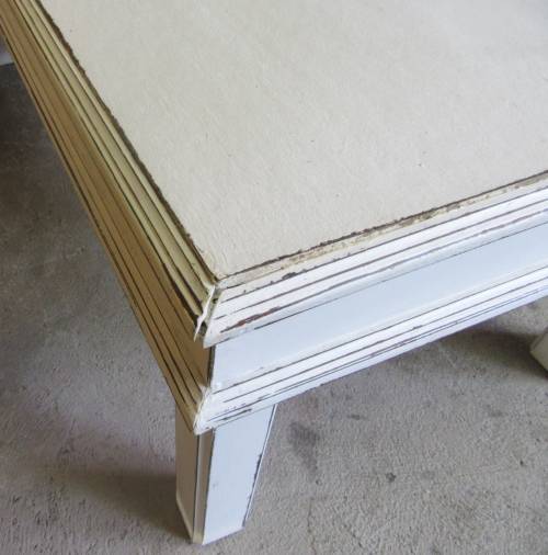 This Distressed Shabby chic table has great character. Love the large rectancular & carved edges