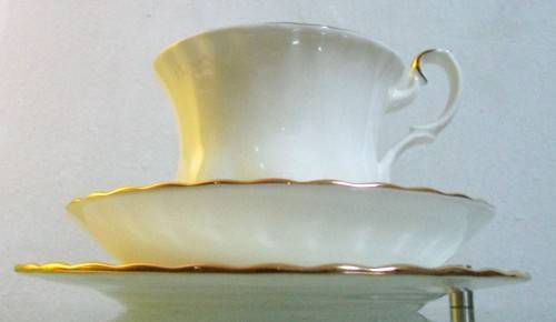 This Royal Albert pattern is named Val D'or, which means Valley of Gold Trio Set