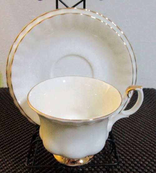 This Royal Albert pattern is named Val D'or, which means Valley of Gold Trio Set