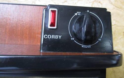 The Corby Trouser Press.  Thermostatic temperature control, self-adjusting section for turn-ups