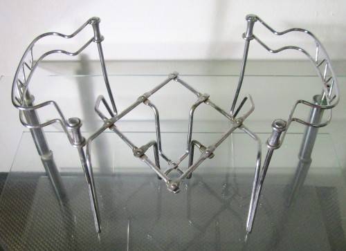 This expanding pot stand easily accommodates a range of shapes and sizes