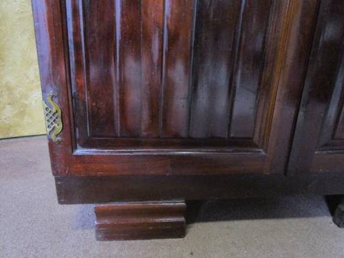 A MARVELOUS VINTAGE IMBUIA TWO DOOR WARDROBE WITH STUNNING DETAILED LEGS