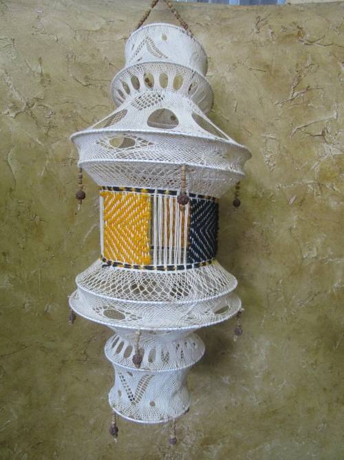 A lovely Vintage macrame plant hanger?