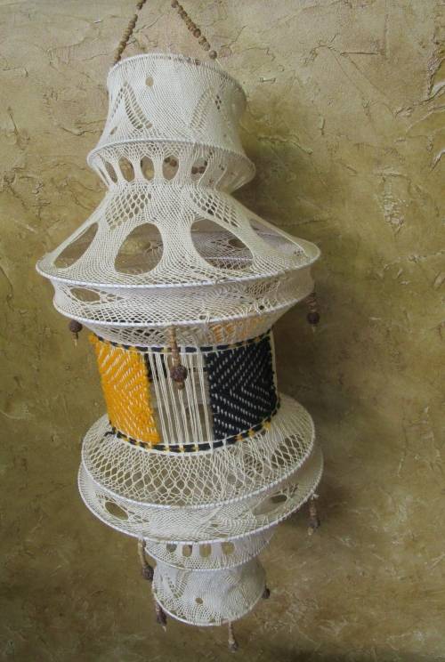 A lovely Vintage macrame plant hanger?