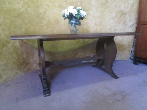 A Fantastic 6 to 8 Seater wooden Table -You can up cycle it by painting it to match your decor.