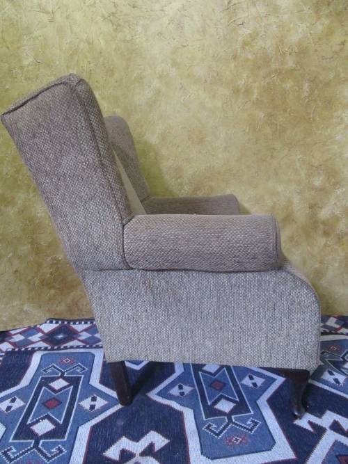 A CHARMING COMFORTABLE WING BACK CHAIR IN EXCELLENT CONDITION