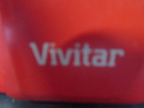 A VIBRANT RED VIVITAR CAMERA NOT TESTED