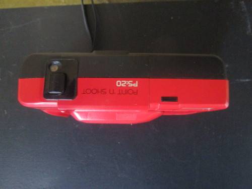 A VIBRANT RED VIVITAR CAMERA NOT TESTED