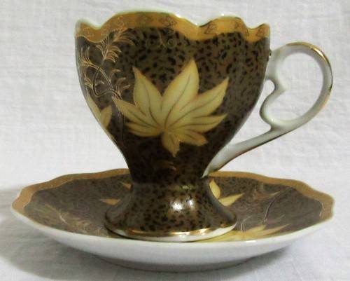 Gorgeous Lily Porcelain Tea Cup and Saucer.  Dark Rich brown with Stunning Gold Detail.