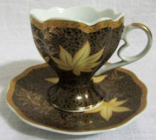 Gorgeous Lily Porcelain Tea Cup and Saucer.  Dark Rich brown with Stunning Gold Detail.