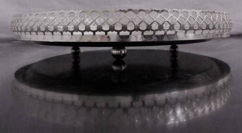 A Vintage Silver plated serving tray - Tray is round, has a pierced gallery edge and a ornate chased