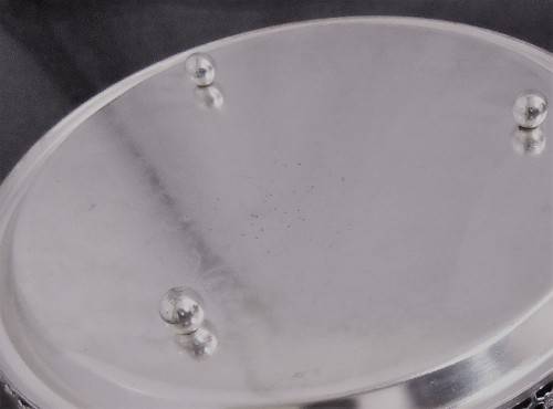 A Vintage Silver plated serving tray - Tray is round, has a pierced gallery edge and a ornate chased