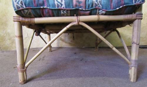 A FANTASTIC SINGLE SEATER CANE COUCH FOR THE PATIO