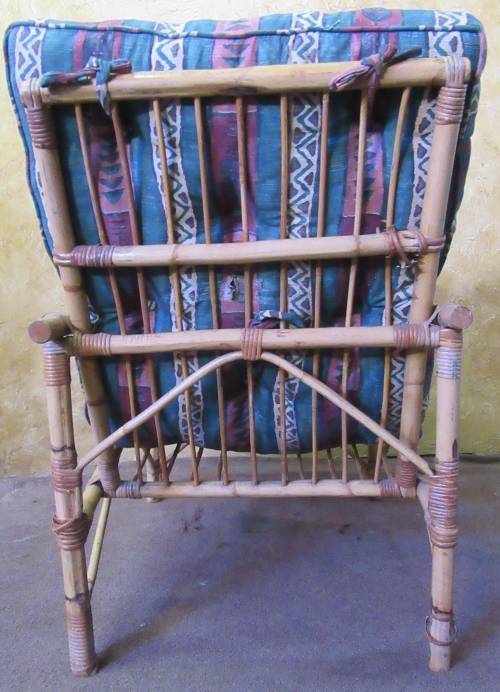 A FANTASTIC SINGLE SEATER CANE COUCH FOR THE PATIO