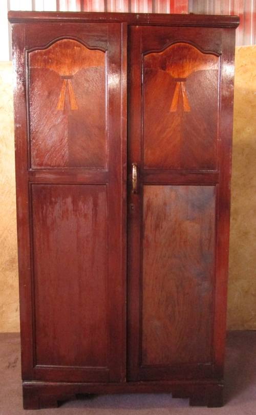 A TWO DOOR VINTAGE WARDROBE WITH HANGING SPACE AND DRAWERS