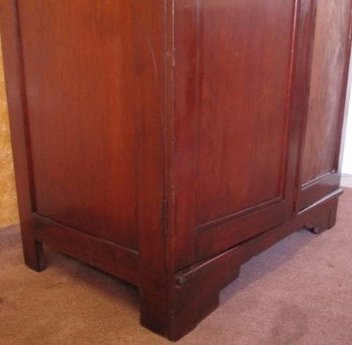 A TWO DOOR VINTAGE WARDROBE WITH HANGING SPACE AND DRAWERS