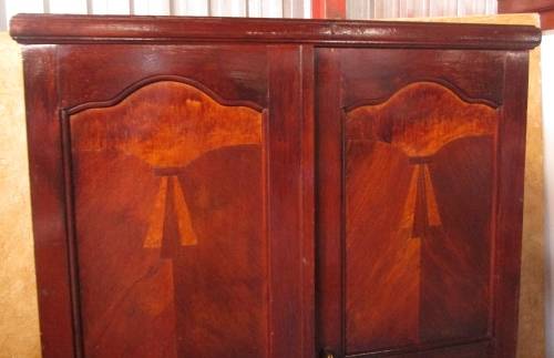 A TWO DOOR VINTAGE WARDROBE WITH HANGING SPACE AND DRAWERS