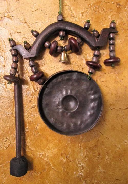 Awesome ornately etched old  gong with burled wood striker-mallet. The gong has loud sound that ling