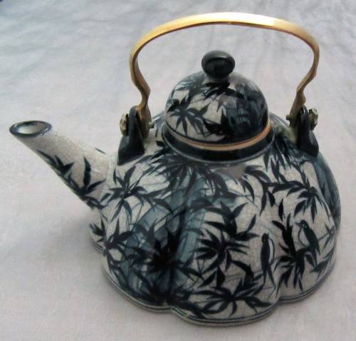 A BEAUTIFULLY DESIGNED TEA POT - HAND PAINTED IN THAILAND