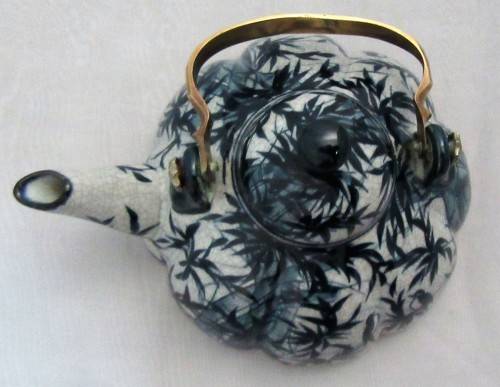 A BEAUTIFULLY DESIGNED TEA POT - HAND PAINTED IN THAILAND