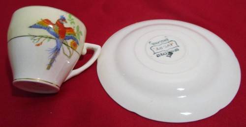 This is four  wonderful GRINDLEY & CO CHINA of ENGLAND IVORY DEMITASSE CUPS and SAUCERS.