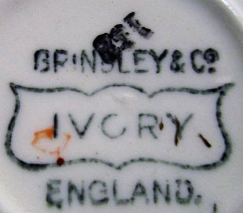 This is four  wonderful GRINDLEY & CO CHINA of ENGLAND IVORY DEMITASSE CUPS and SAUCERS.