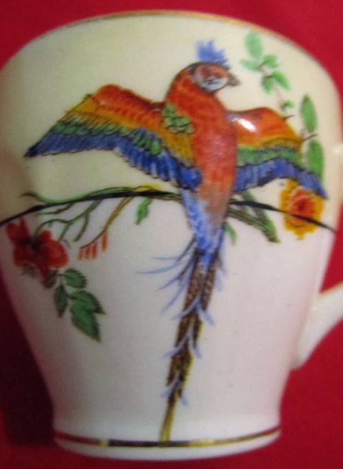 This is four  wonderful GRINDLEY & CO CHINA of ENGLAND IVORY DEMITASSE CUPS and SAUCERS.