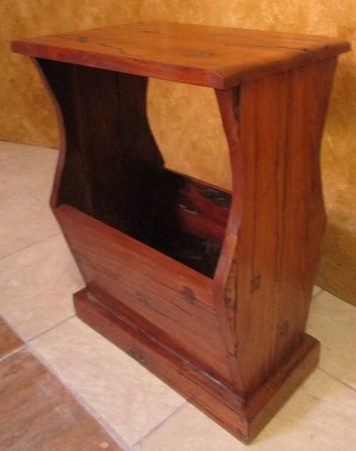 A MARVELOUS SOLID TEAK SIDE TABLE WITH A MAGAZINE RACK