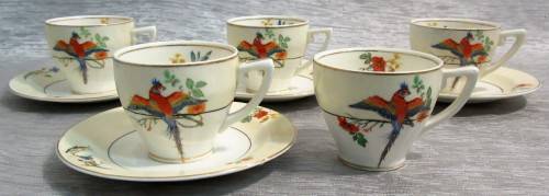 This is four  wonderful GRINDLEY & CO CHINA of ENGLAND IVORY DEMITASSE CUPS and SAUCERS.