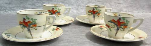 This is four  wonderful GRINDLEY & CO CHINA of ENGLAND IVORY DEMITASSE CUPS and SAUCERS.