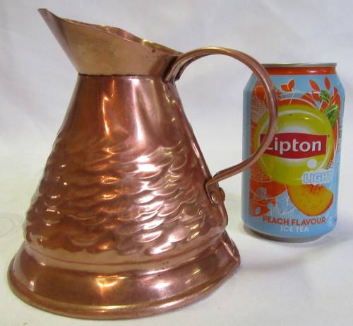 A MARVELOUS VINTAGE HAMMERED COPPER WATER PITCHER WILL MAKE A STUNNING FLOWER VASE