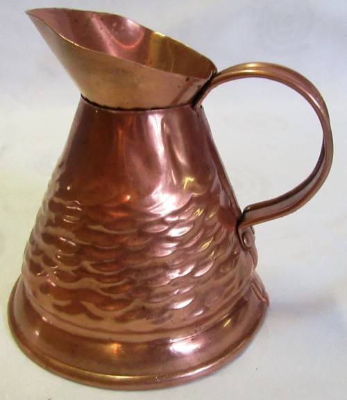 A MARVELOUS VINTAGE HAMMERED COPPER WATER PITCHER WILL MAKE A STUNNING FLOWER VASE