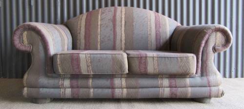 A VERY COMFORTABLE 2 SEATER SOFA FABRIC IS FAIR ONE OR TWO SCUFS - OR FOR RECOVERY