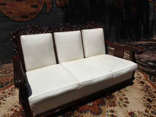 Beautifully carved three-seater imbuia Ball and Claw in good condition