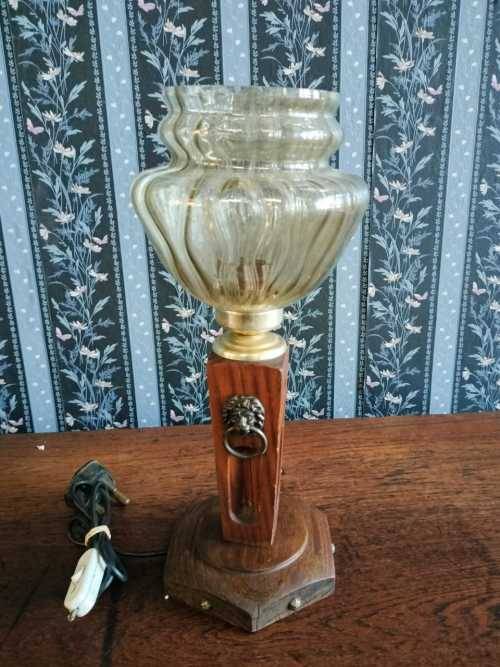 Vintage wooden table lamp with a glass shade