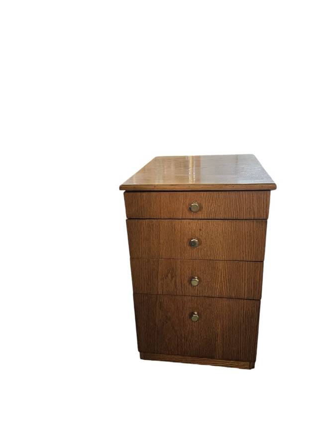 Elevate your office or bedside with this  Oak Finished set of drawers on casters,