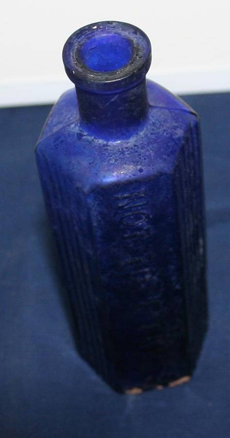 BEAUTIFUL ANTIQUE BLUE GLASS BOTTEL EMBOSSED WITH NOT TO BE TAKEN
