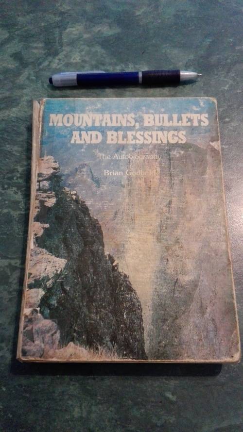 MOUNTAINS BULLETS AND BLESSINGS The Autobiography of Brian Godbold ( signed ) (a reading copy )