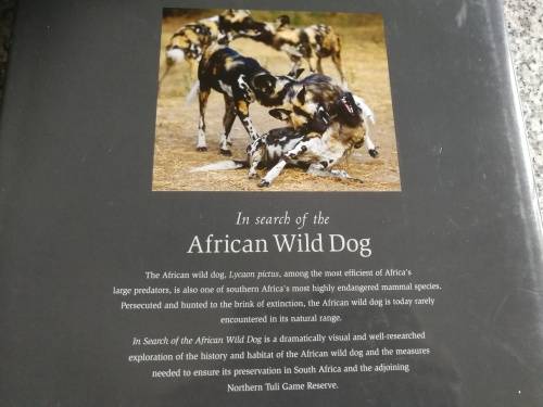 Signed by both Authors IN SEARCH OF THE AFRICAN WILD DOG ROGER and PAT DE LA HARPE  signed