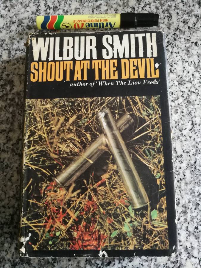 WILBUR SMITH SHOUT AT THE DEVIL  HEINEMAN 1978 First Edition 1968