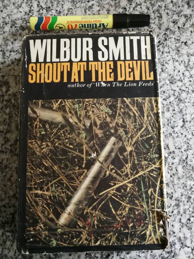 WILBUR SMITH SHOUT AT THE DEVIL  HEINEMAN 1978 First Edition 1968
