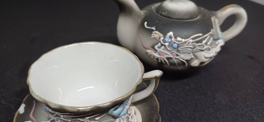 Miniature teapot and teacup