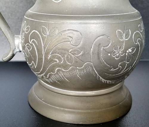 Beautiful Pewter Jug with ornate engravings