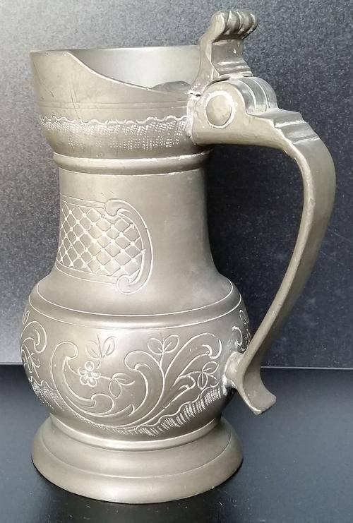 Beautiful Pewter Jug with ornate engravings