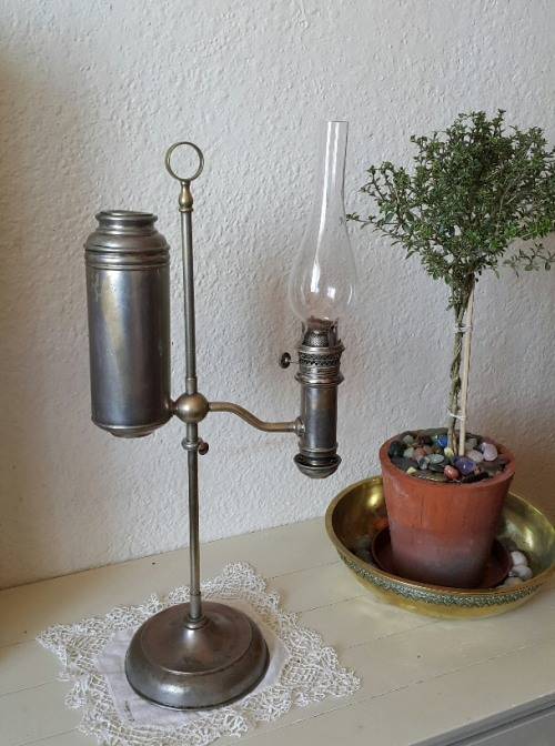 Antique student oil ¿ kerosene lamp, working